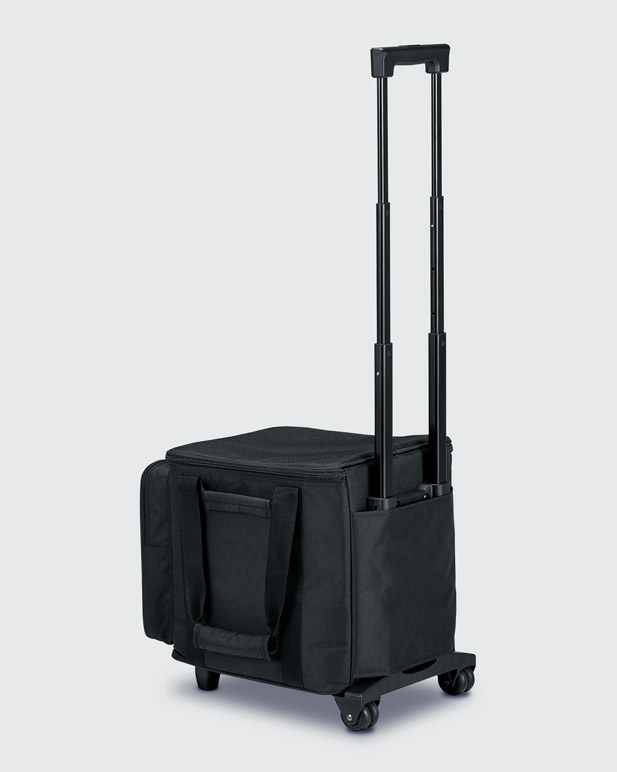 A PA system carrying bag sitting up right.
