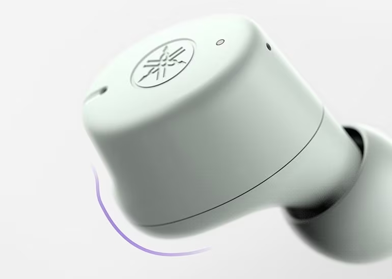 Closeup image of the TW-E3C Green earbud.